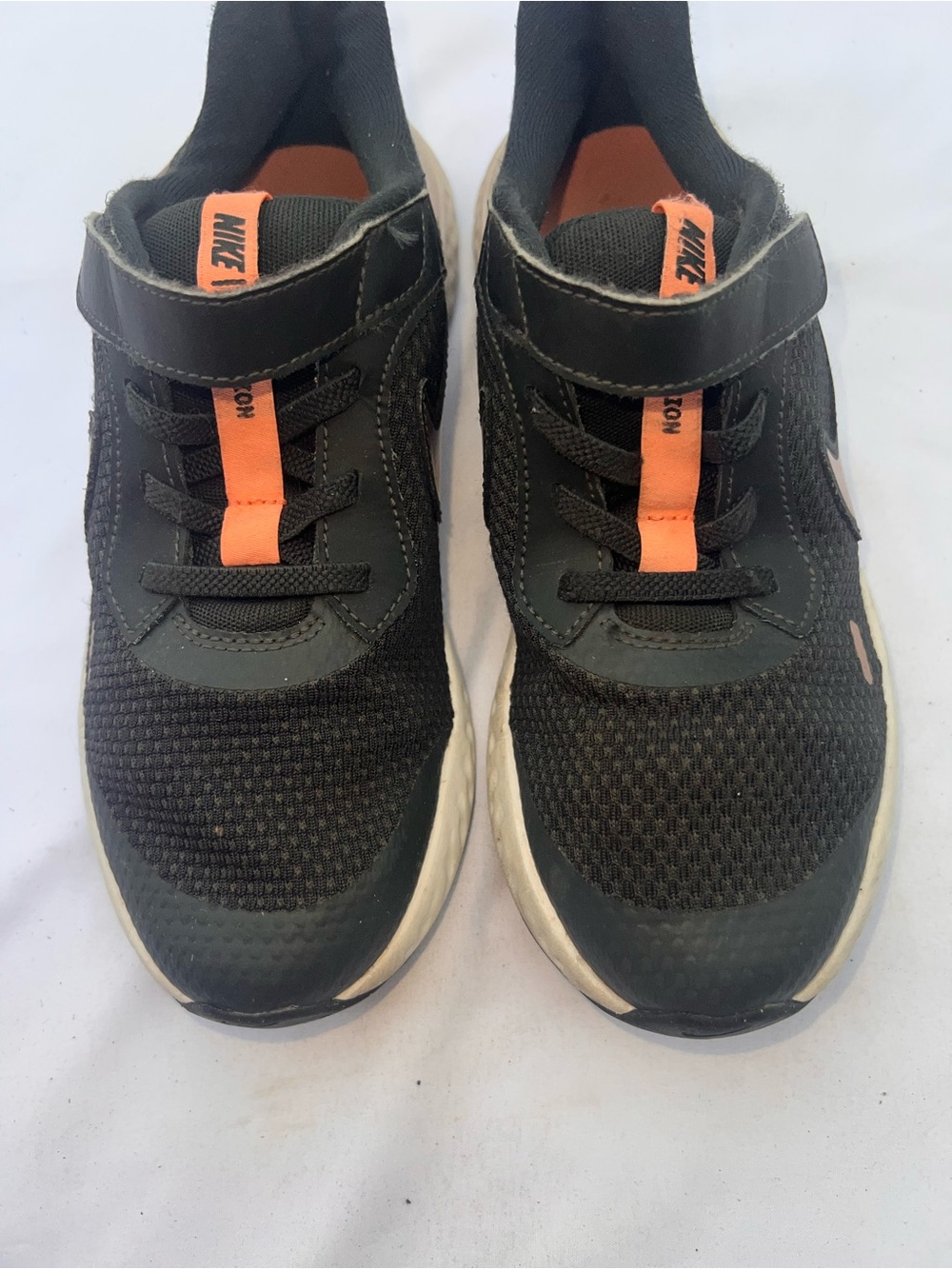 Nike Kids Black Sneakers with Orange Accent
